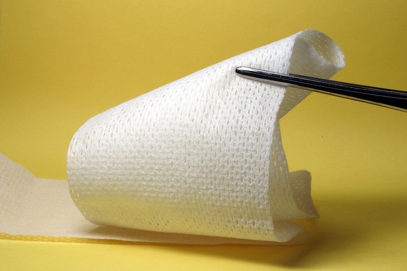 gauze bandage with tweezers