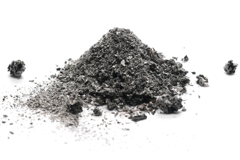 A pile of ash isolated on white background