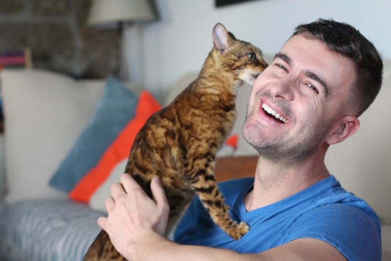 Why Does My Cat Bite My Ear? 10 Common Reasons