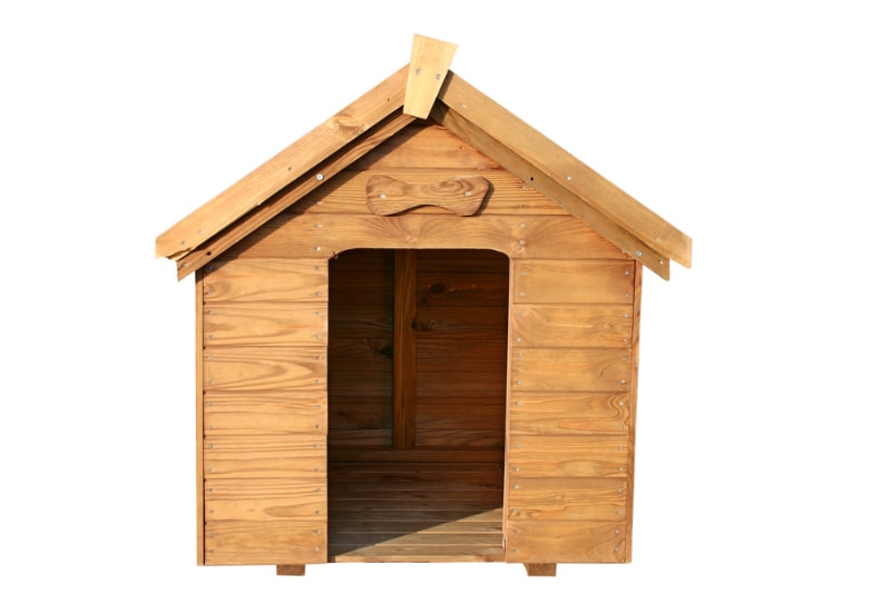 a wooden dog house