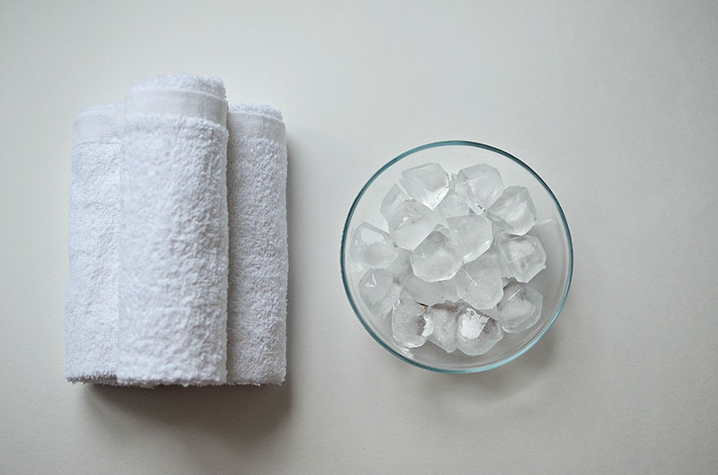 white cotton towels with ice pack